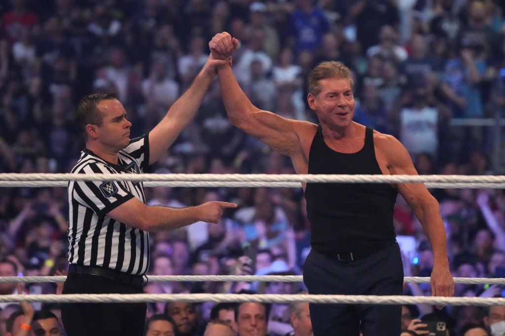 WWE owner Vince McMahon celebrates during WrestleMania in 2022.