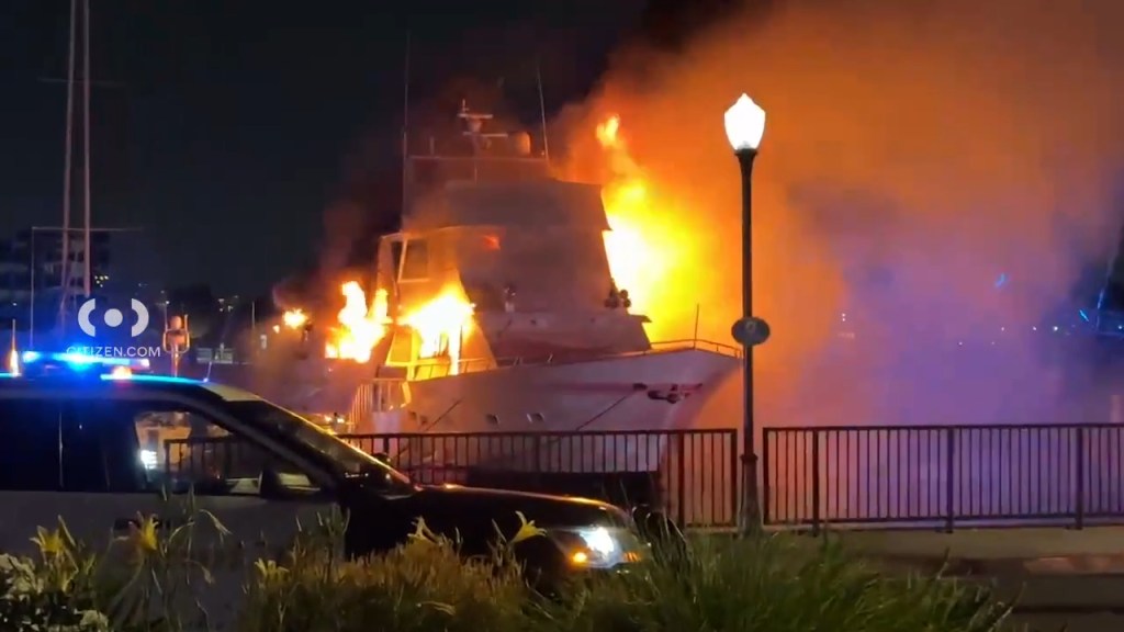 The Admiral yacht is pictured engulfed in flames.