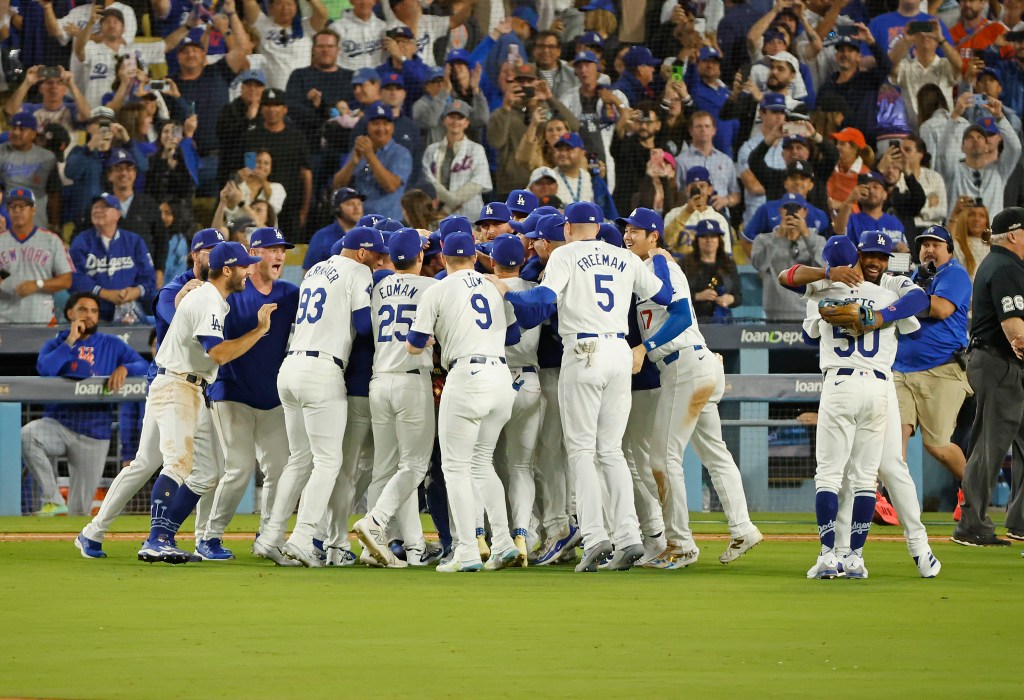 The Dodgers celebrate after eliminating the Mets in the NLCS on Oct. 20, 2024.