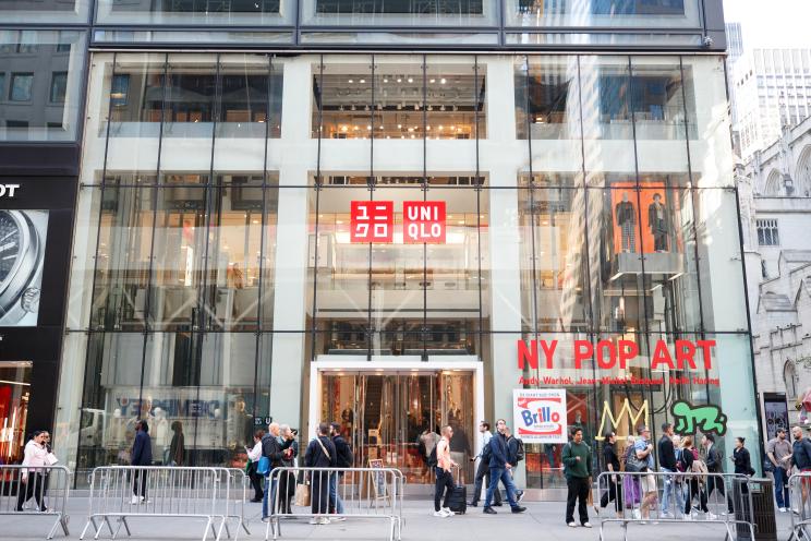 A group of people outside the Uniqlo store at 660 5th Avenue.