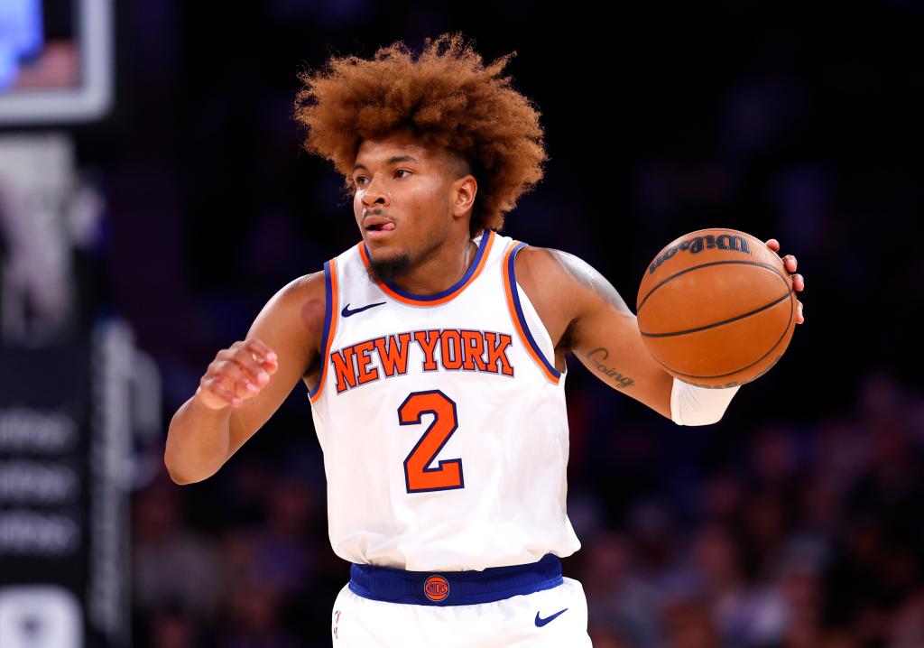 New York Knicks guard Miles McBride (2) handles the ball against the Charlotte Hornets during the second half of a preseason basketball game at Madison Square Garden, Tuesday, Oct. 15, 2024 in New York. 