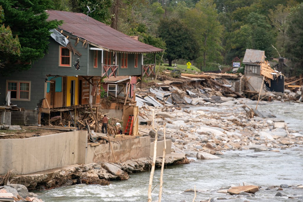 Destroyed houses and buildings along the Broad River in the aftermath of Hurricane Helene on October 1, 2024 in Bat Cave, North Carolina. 