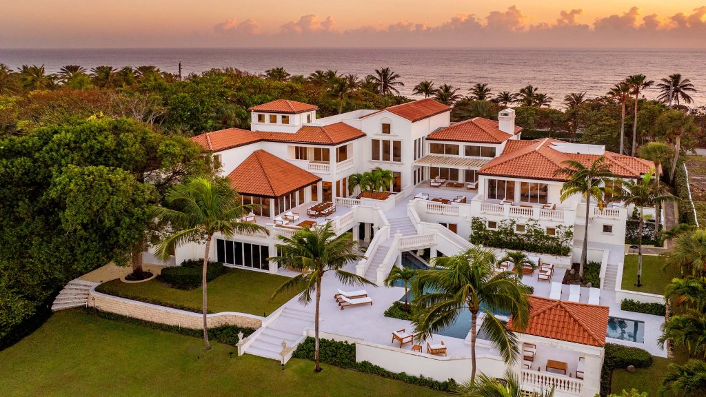 The 12,378 sq ft home, located at 1840 South Ocean Boulevard features 8 bedrooms, 10 full bathrooms, and 1 half bath. 