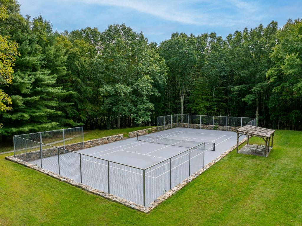 The tennis court. 