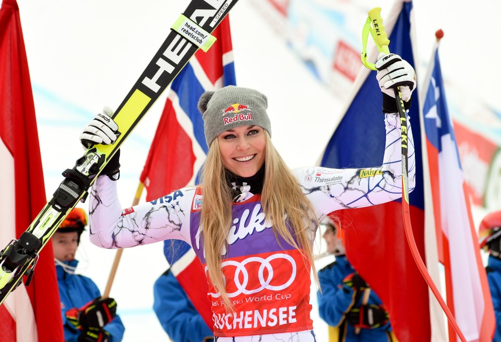 Lindsey Vonn, of the United States, celebrates in the finish area after winning an alpine ski, women's World Cup downhill, in Altenmarkt-Zauchensee, Austria on January 9, 2016. 