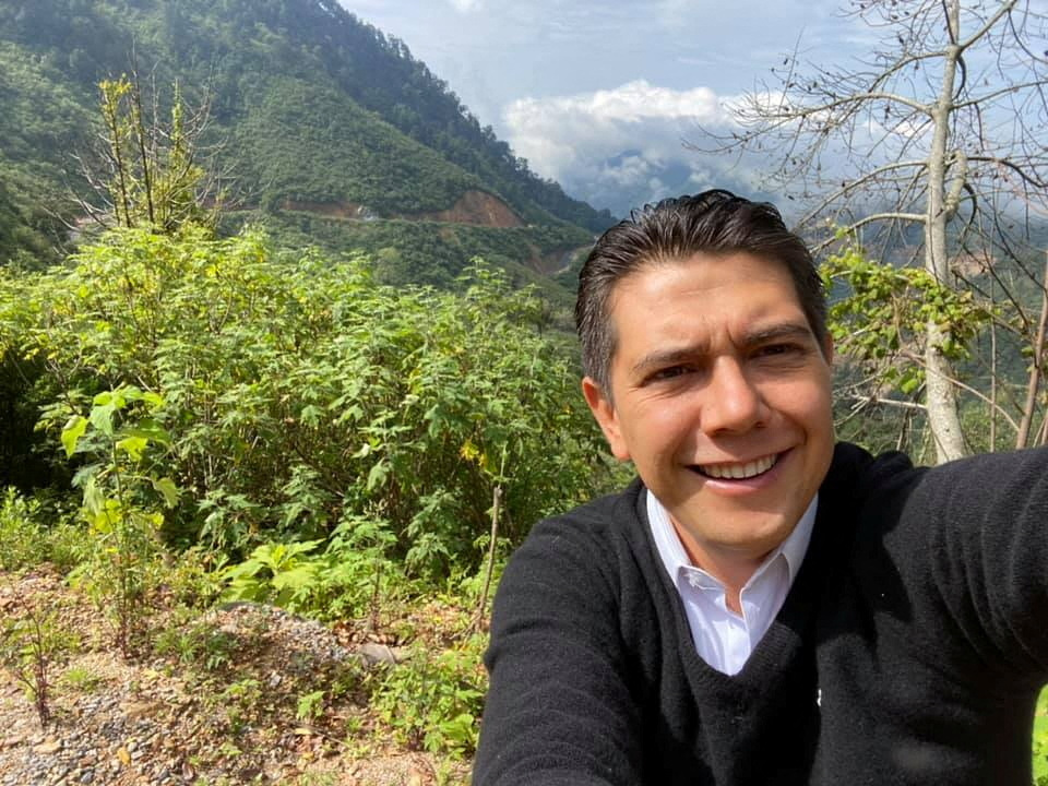 Mayor of Chilpancingo Alejandro Arcos taking a selfie in a forest.