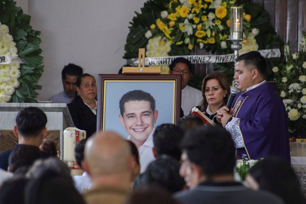 A portrait of Alejandro Arcos, the mayor of Chilpancingo who was killed on Sunday less than a week after taking office, is shown at his funeral service as Mexico's President Claudia Sheinbaum is set to unveil a new security policy, in Chilpancingo, Mexico October 7, 2024. 