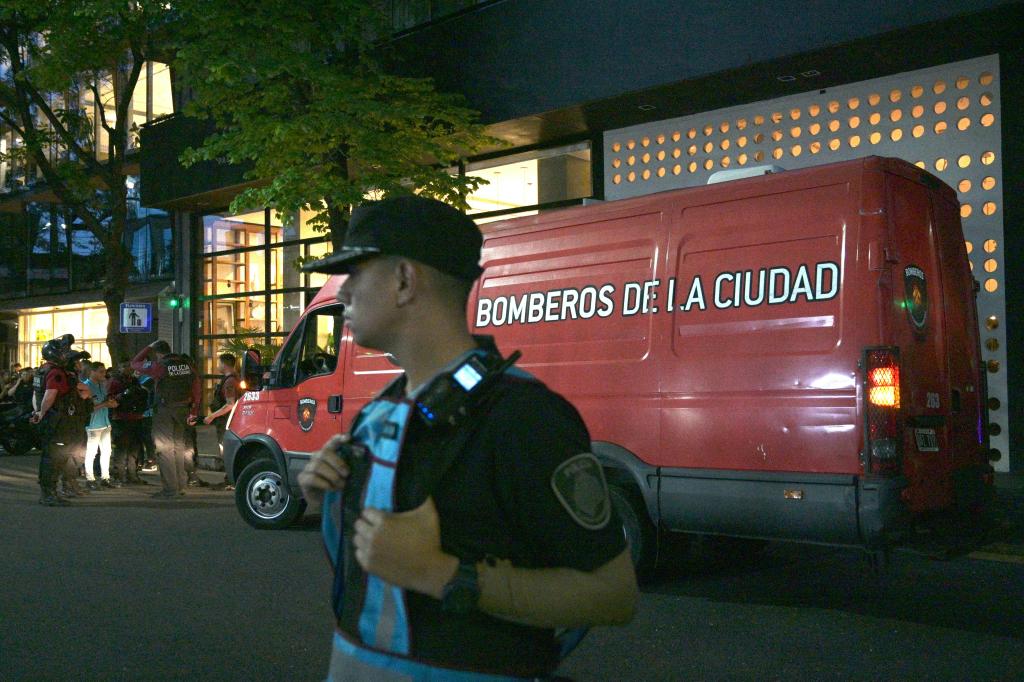 Emergency services arrive at the Buenos Aires hotel on Oct. 16.