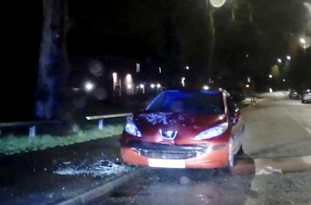 Declan Muers driving at high speed in his blue Volkswagen Scirocco through Nottingham city centre, running five red lights and eventually crashing into two parked cars, as captured by police dashcam.