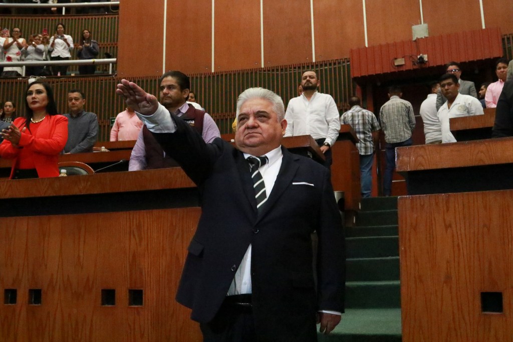 Dr. Gustavo Alarcón is sworn into office after his predecessor was beheaded.