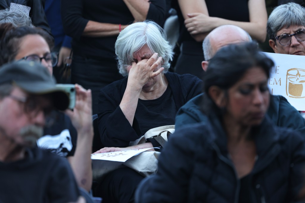 People attend a vigil at Union Square to mark the first anniversary of the October 7th attacks on October 07, 2024 in New York City. 