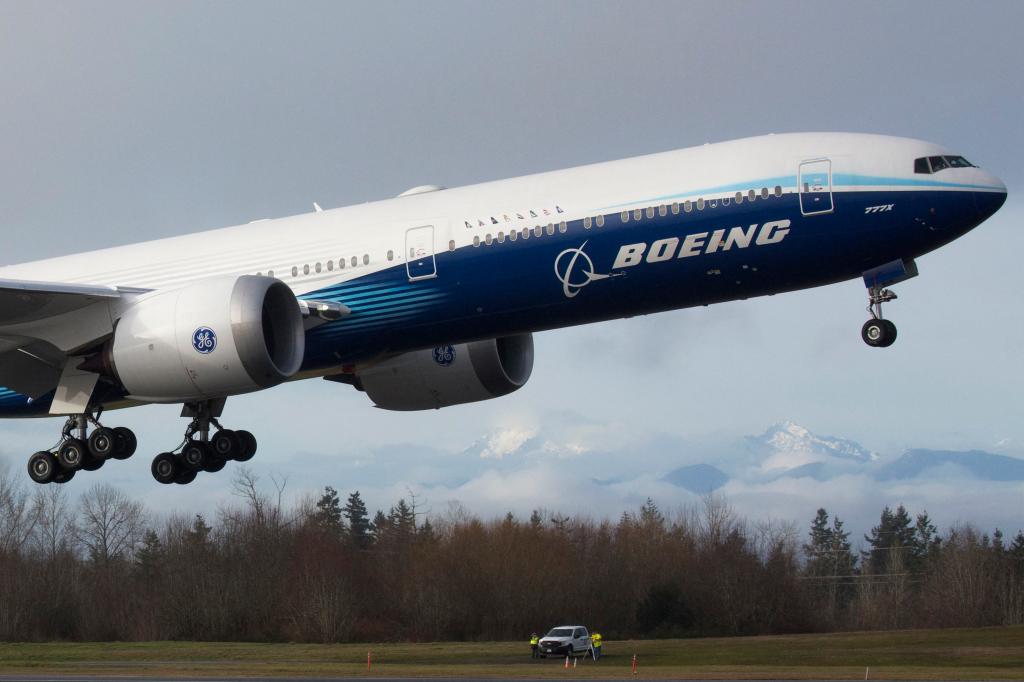 Boeing 77X airplanes takes off.