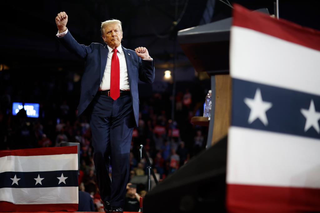 Trump dances off stage at the conclusion of a campaign rally at the Santander Arena on October 09, 2024 in Reading, Pennsylvania. 