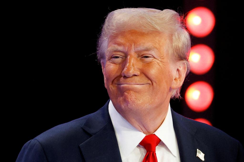 Republican presidential nominee and former U.S. President Donald Trump participates in a town hall presented by Spanish-language network Univision, in Doral, Florida, U.S., October 16, 2024. 