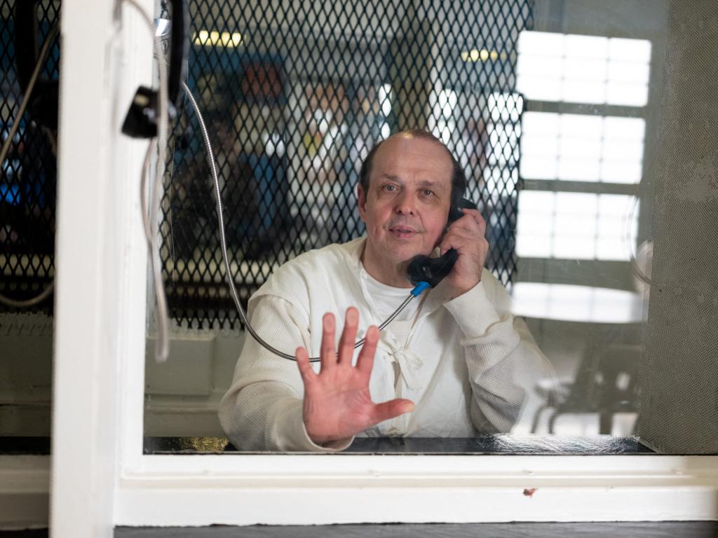 Roberson sits behind plexiglass at the Texas Department of Criminal Justice Polunsky Unit on Livingston, Texas on Dec. 19, 2023.