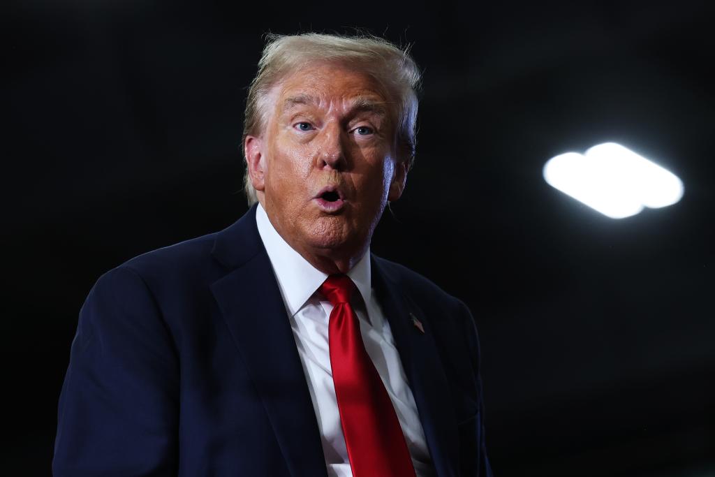 Republican presidential nominee, former U.S. President Donald Trump looks out into the crowd after speaking during a campaign rally at Riverfront Sports on October 09, 2024 in Scranton, Pennsylvania.