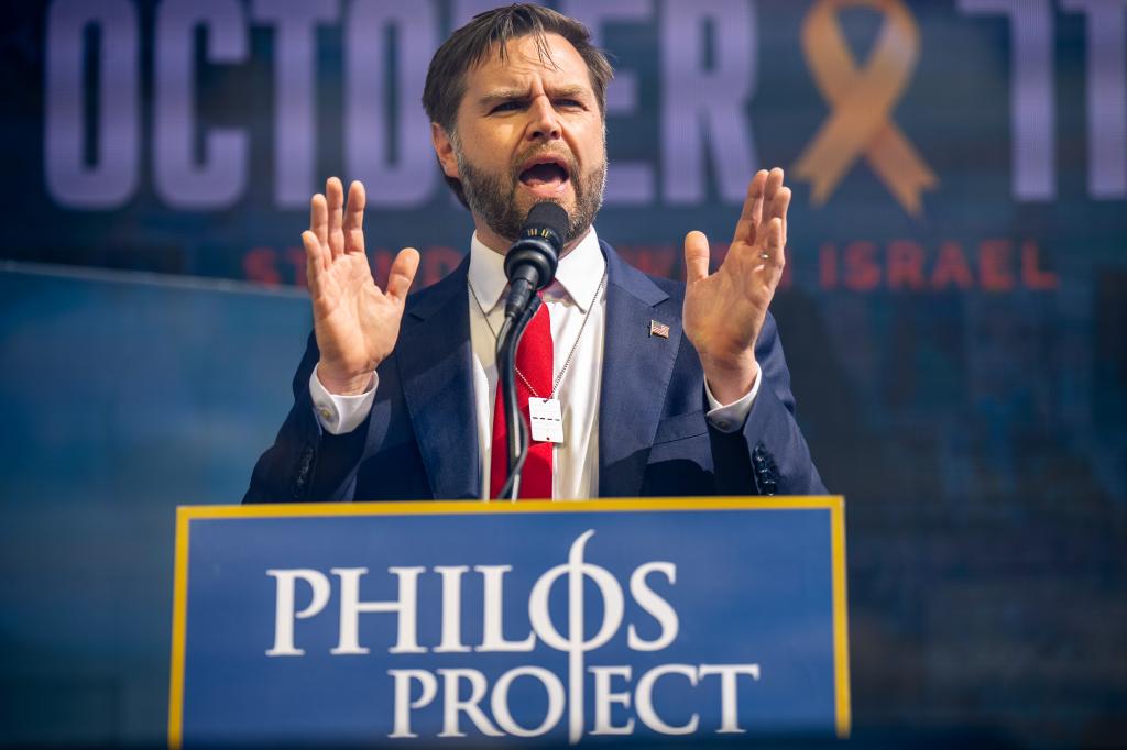 Sen. J.D. Vance (R-OH) wears a necklace that reads "Bring Them Home Now!" as he speaks during a Philos Project October 7th Memorial Rally at the Washington Monument on October 7, 2024.