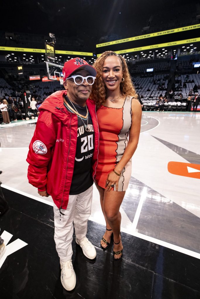 Spike Lee and Ros Gold-Onwude posing for a photo prior to Game 5 of the 2024 WNBA Finals between Minnesota Lynx and New York Liberty at Barclays Center