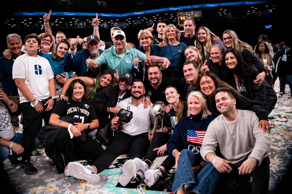 The Liberty celebrate their WNBA championship win on Oct. 20, 2024.