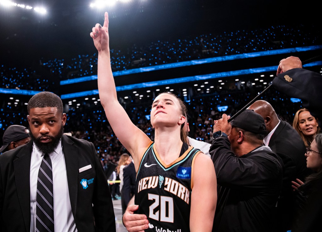 Sabrina Ionescu celebrates the Liberty's WNBA championship on Oct. 20, 2024.