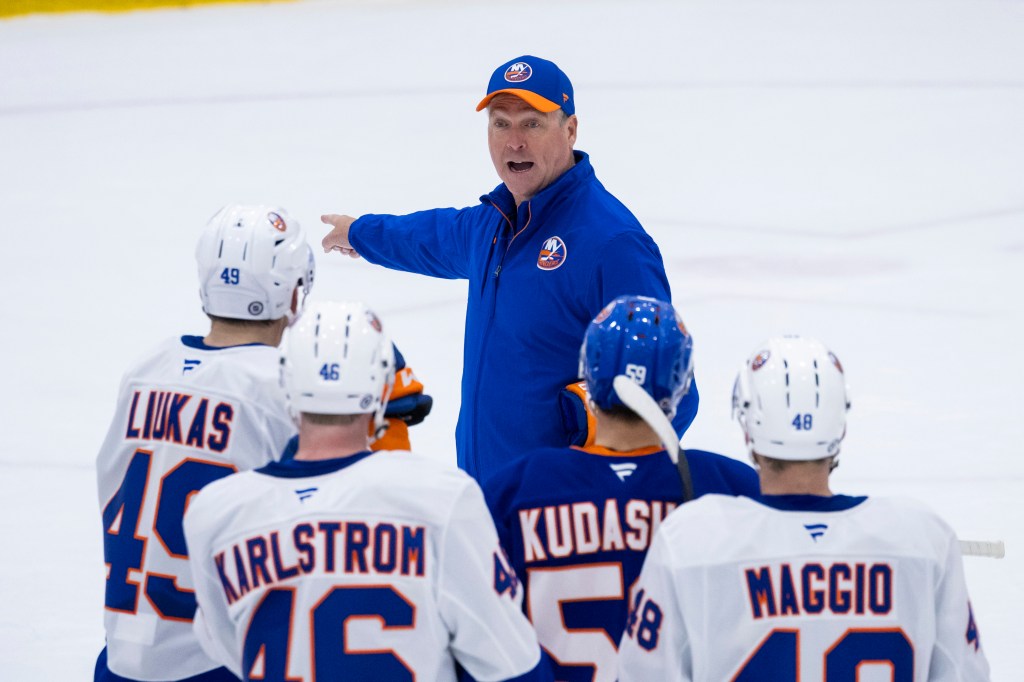 New York Islanders head coach Patrick Roy speaks to the team during practice at the Northwell Health Ice Center, Thursday, Sept. 19, 2024, in East Meadow, NY. 