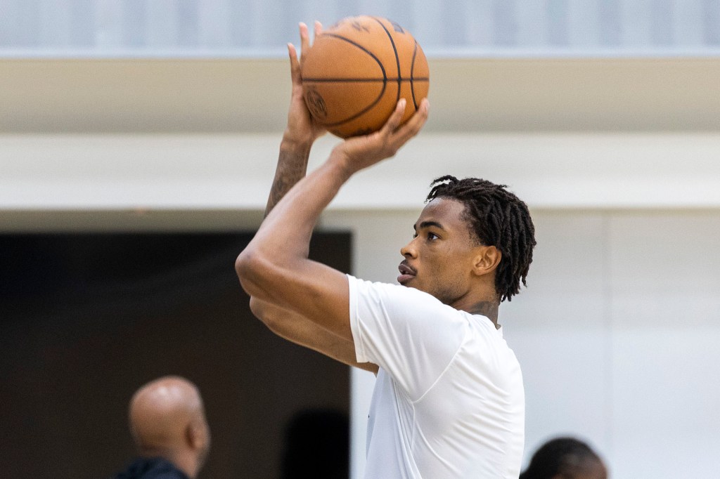 Nets center Nic Claxton shoots during practice.