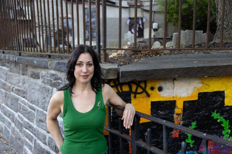 K. Krombie, tour guide at Purefinder and author of Death in New York: History and Culture of Burials, Undertakers and Executions, leads her Death in New York tour stopping at City Hall Park on Oct. 20, 2024.