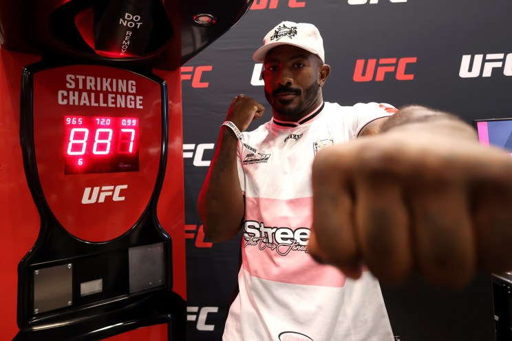 Khalil Rountree Jr. interacts with the UFC Striking Challenge during the Fanatics Fest NYC 2024 in August.