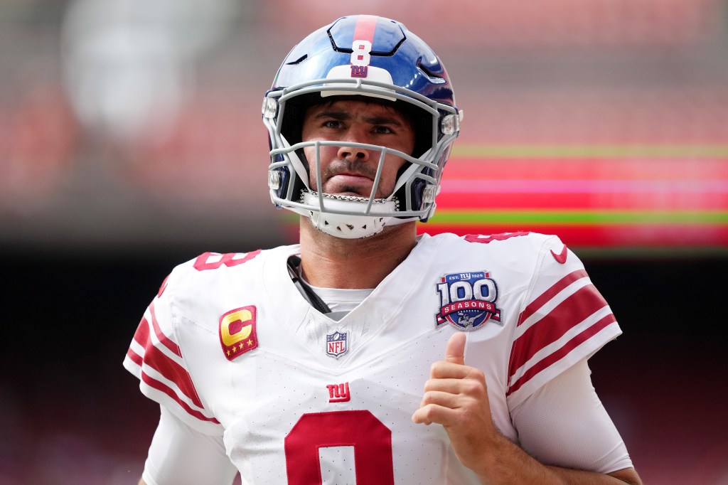 Quarterback Daniel Jones #8 of the New York Giants looks on before the game against the Cleveland Browns at Cleveland Browns Stadium on September 22, 2024 in Cleveland, Ohio. 