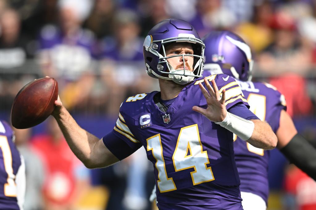 Quarterback Sam Darnold #14 of the Minnesota Vikings passes the ball against the Houston Texans during the second quarter at U.S. Bank Stadium on September 22, 2024 in Minneapolis, Minnesota.