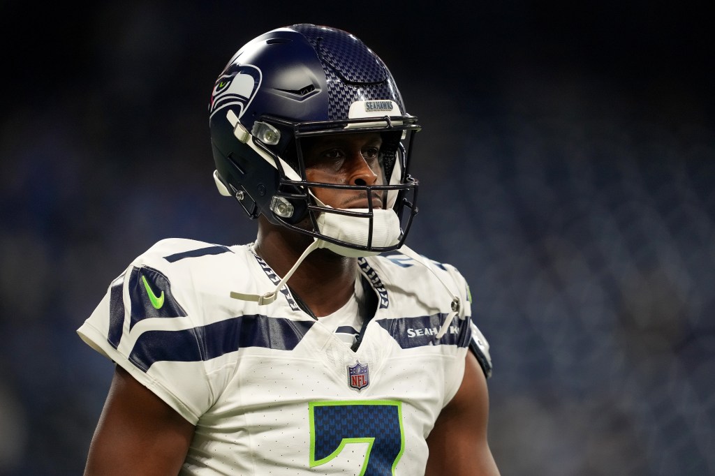 Geno Smith #7 of the Seattle Seahawks warms up prior to the game against the Detroit Lions at Ford Field on September 30, 2024 in Detroit, Michigan.