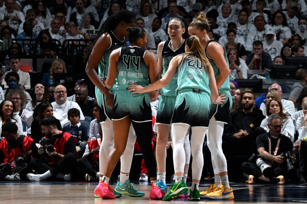 The New York Liberty huddle during the game against the Minnesota Lynx during Game Four of the 2024 WNBA Finals on October 18, 2024 at Target Center in Minneapolis, Minnesota.