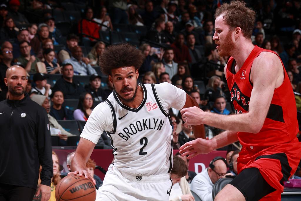 Cam Johnson of the Nets drives to the basket during an exhibition game Friday at Barclays Center.