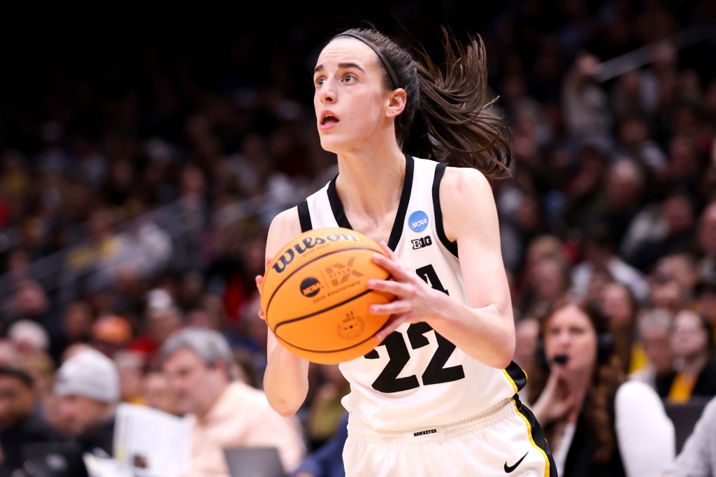 Caitlin Clark #22 of the Iowa Hawkeyes shoots the ball against the Louisville Cardinals during the third quarter in the Elite Eight round of the NCAA Women's Basketball Tournament at Climate Pledge Arena on March 26, 2023 in Seattle, Washington.