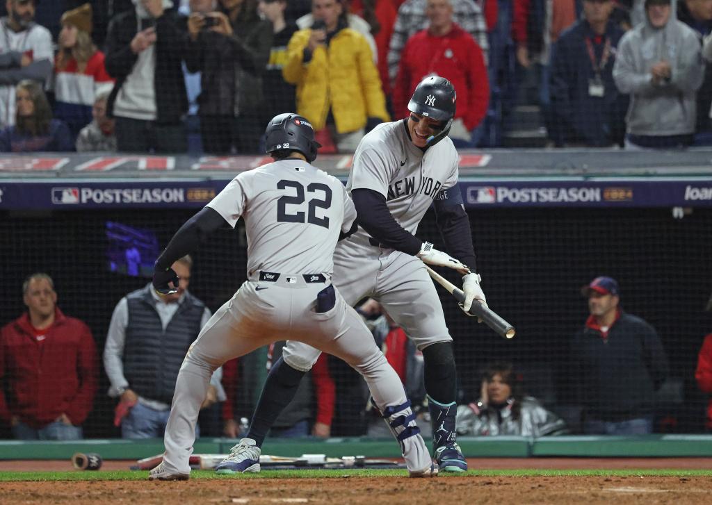 Juan Soto #22 of the New York Yankees celebrates with Aaron Judge #99 of the New York Yankees after he scores on the game winning three-run home run