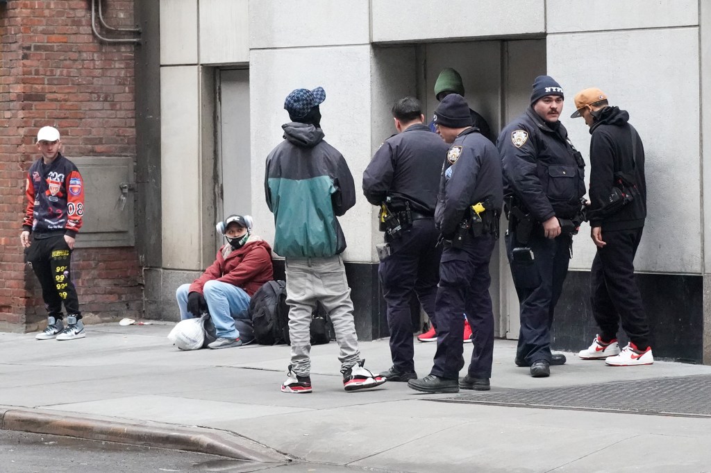 Front on W 42st,, is the location where NYPD were beaten by migrants from the shelter, the perps were released after being arrested.