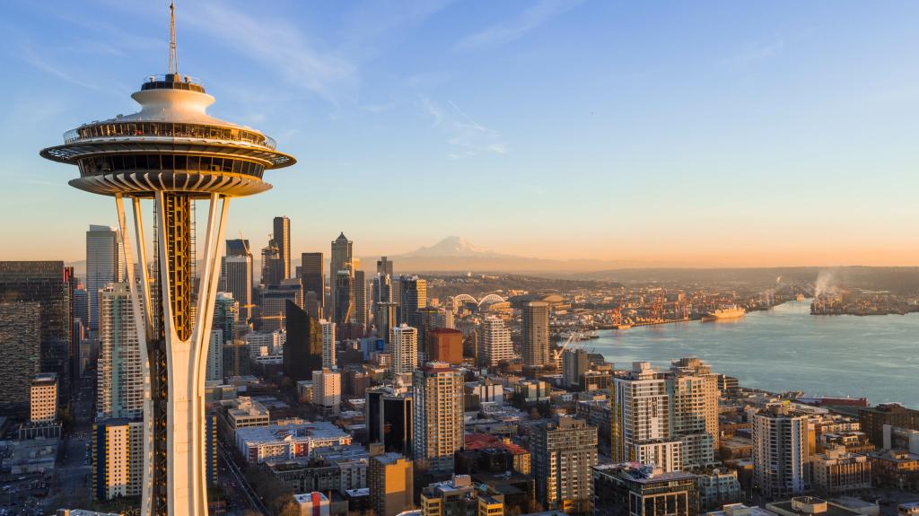 Seattle Skyline at sunset featuring the Space Needle and Korey Toomer