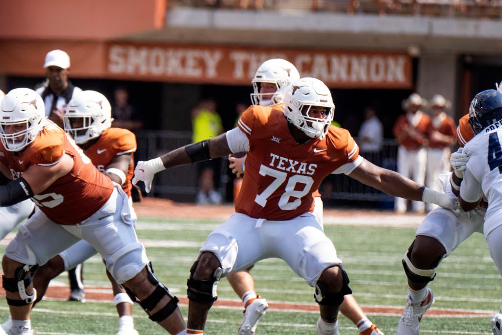 Texas offensive lineman Kelvin Banks (78) blocks during the first half of an NCAA football game against Rice, Saturday, Sept. 2, 2023, in Austin, Texas. 