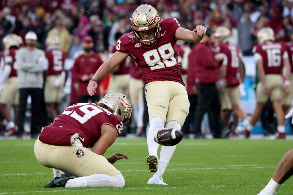 Florida State's Ryan Fitzgerald kicks the ball against Georgia Tech at Aviva stadium in Dublin, Saturday, Aug. 24, 2024.