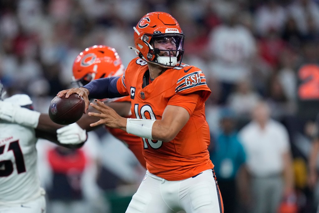 Chicago Bears quarterback Caleb Williams throws during the first half of an NFL football game against the Houston Texans Sunday, Sept. 15, 2024, in Houston.