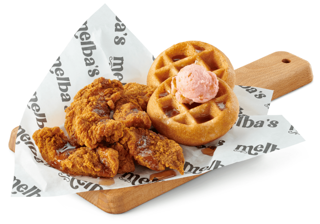 Fried chicken and waffles attractively plated.