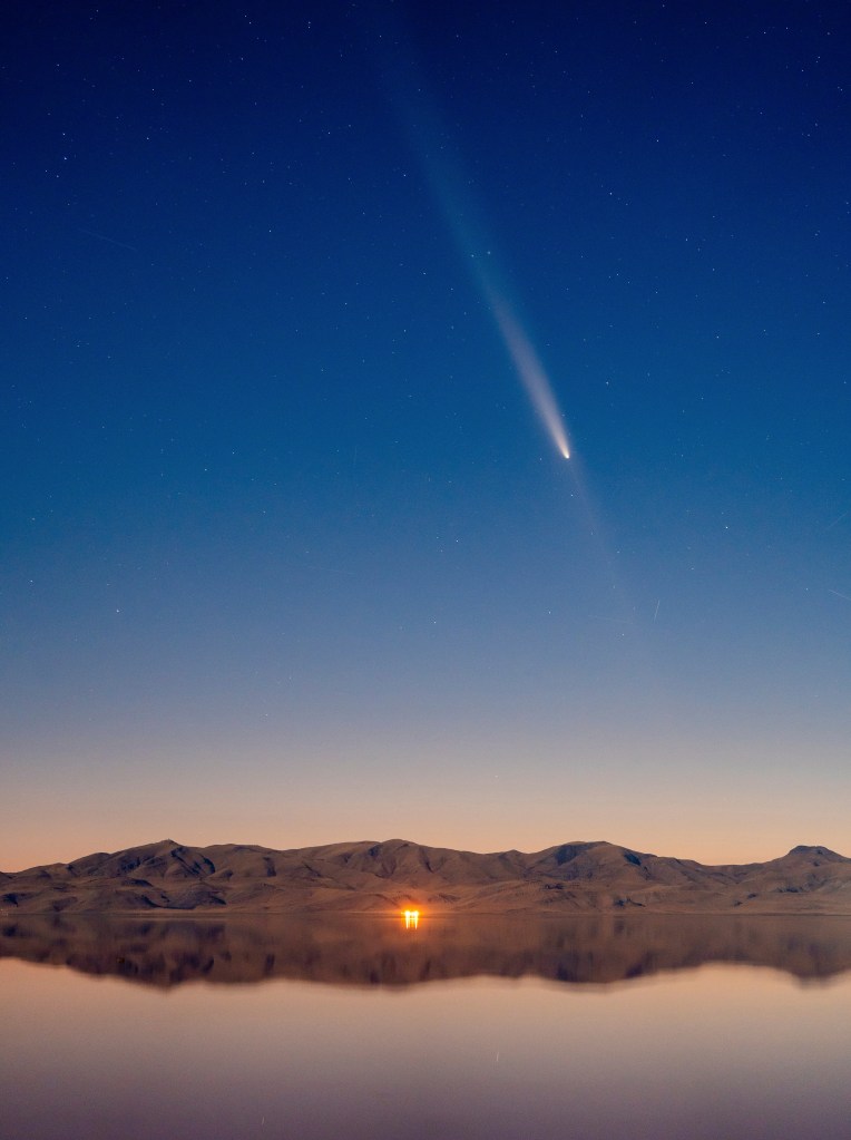 Another recent comet, Comet C/2023 A3 is seen overhead. In the next few days, Comet C/2024 S1 will pass by the Earth.