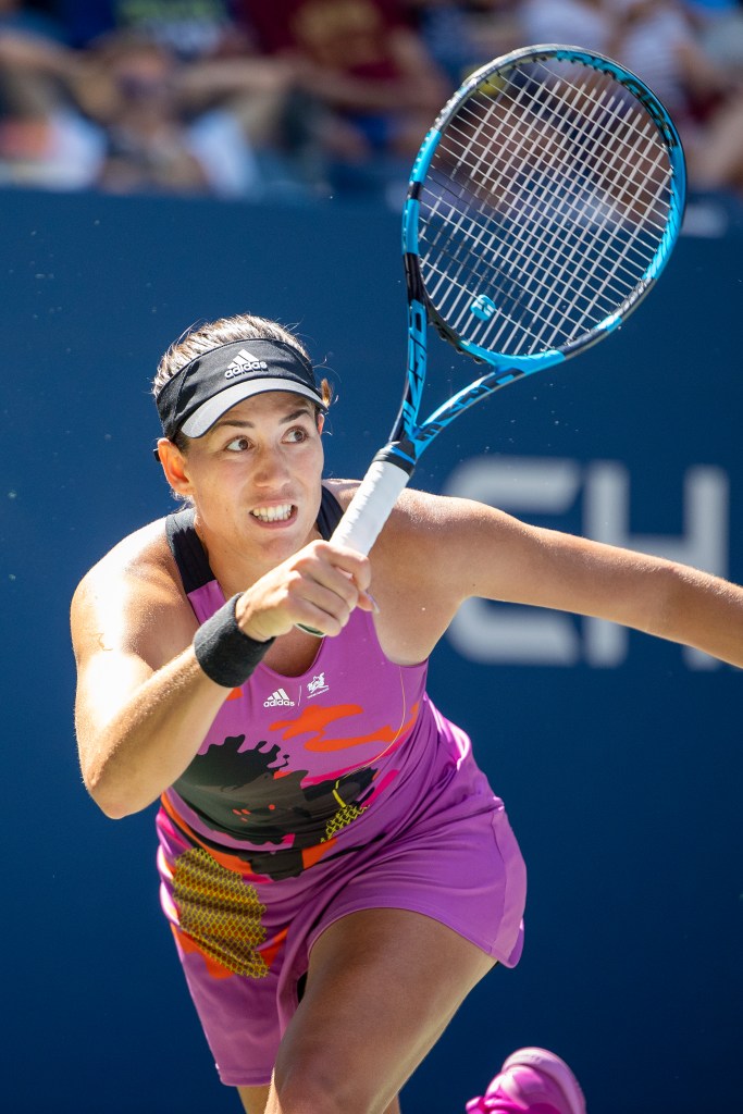 Muguruza plays a point during her singles third round match in Louis Armstrong Stadium on Sept. 3, 2022.