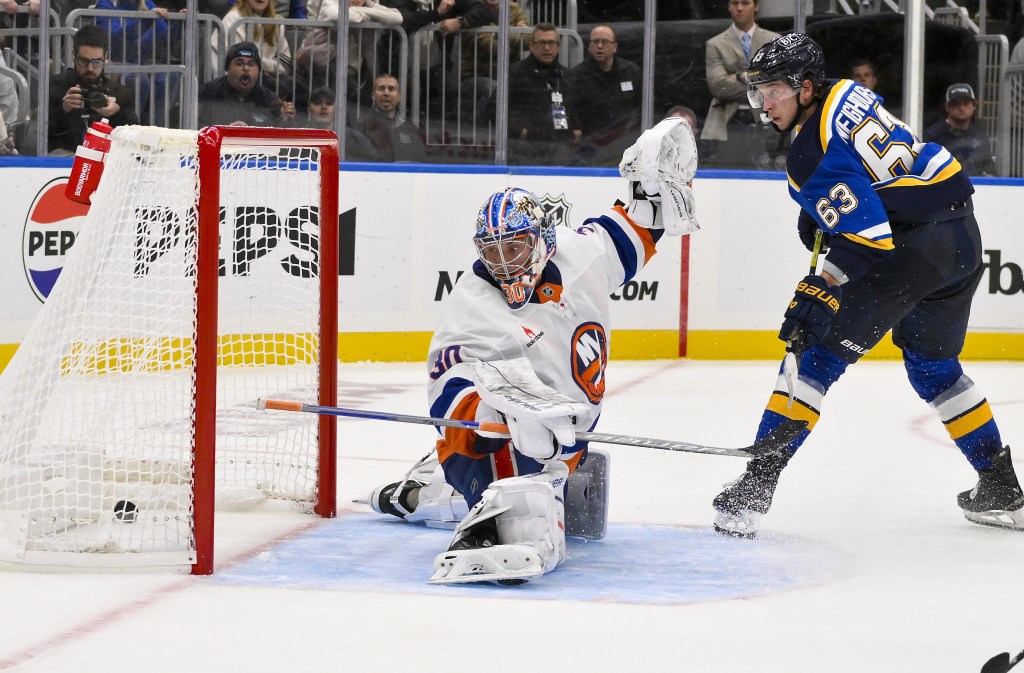 Jake Neigbours scores the game-winning goal on Ilya Sorokin in the Islanders' 1-0 overtime loss to the Blues.