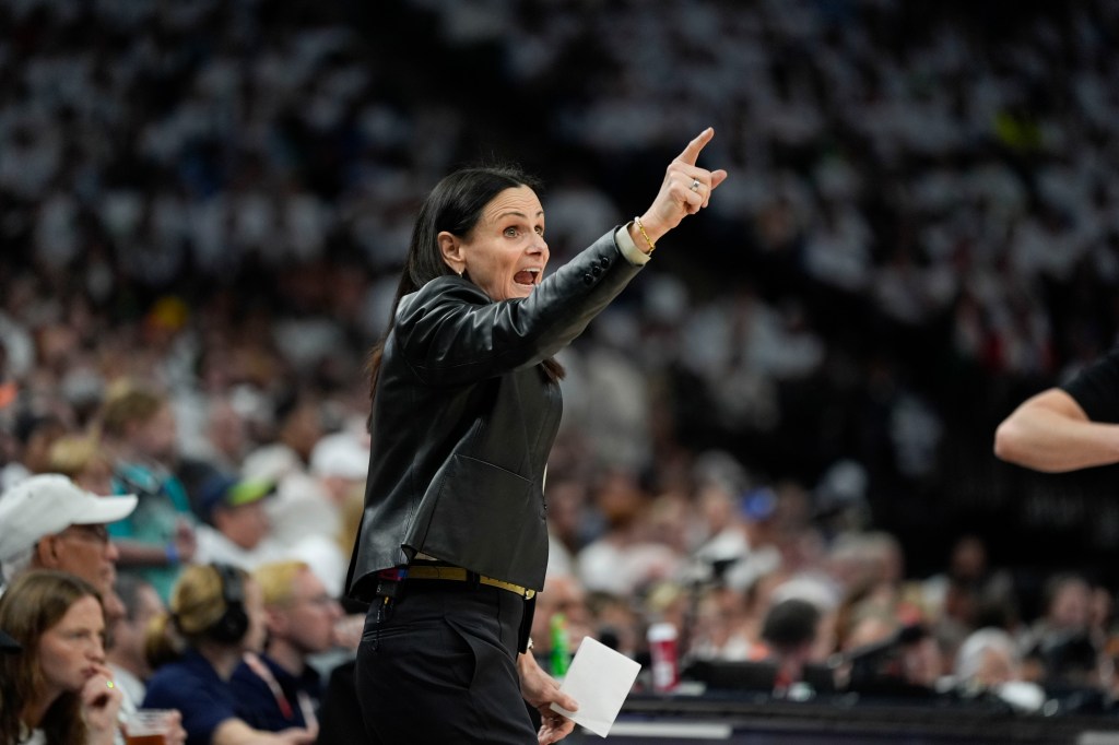 New York Liberty head coach Sandy Brondello calls out from the bench during the second half of Game 4 of a WNBA basketball final playoff series against the Minnesota Lynx, Friday, Oct. 18, 2024, in Minneapolis.