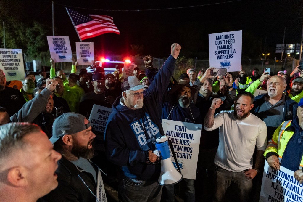 International Longshoreman's Association President, Harold J. Daggett, center, speaks to union workers at the Port Newark/Elizabeth-Port Authority Marine Terminal complex on Tuesday Oct. 1, 2024 in New Jersey.