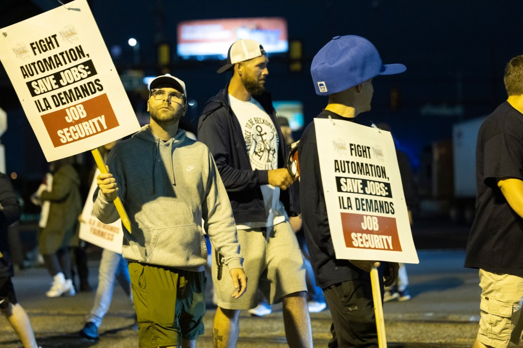 Striking Philadelphia longshoreman picket outside the Packer Avenue Marine Terminal Port, Tuesday, Oct. 01, 2024.