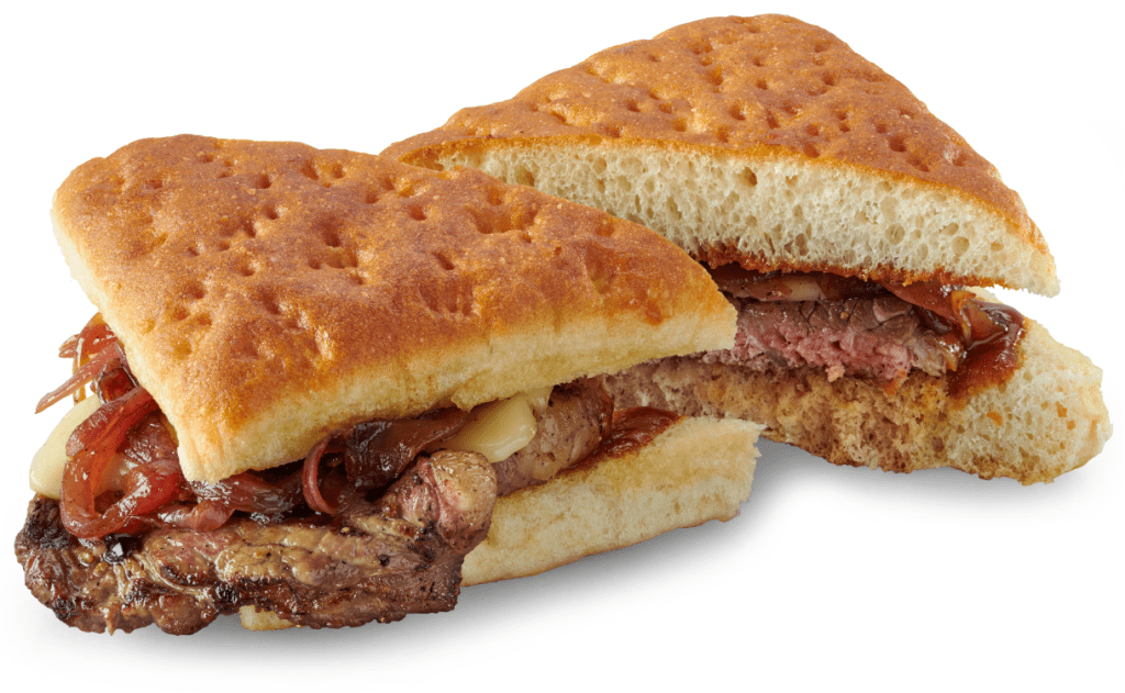 A steak sandwich on focaccia bread.