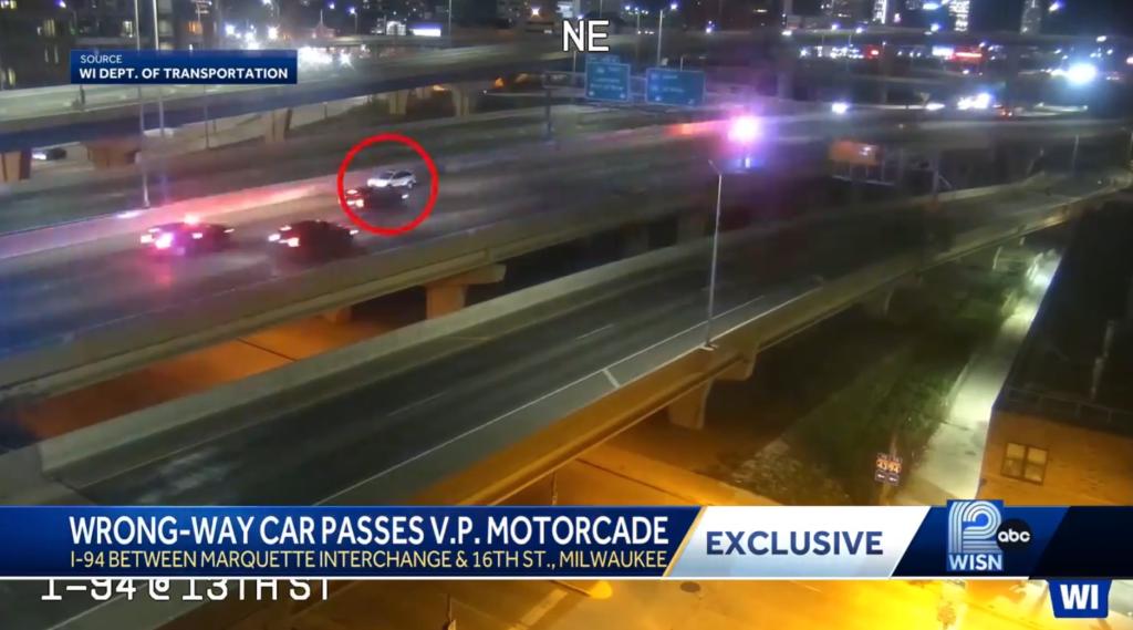 A car driving in the wrong direction passing Vice President Kamala Harris' motorcade in Milwaukee
