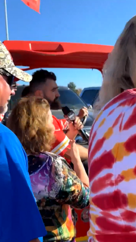 Jason Kelce parading through the Chiefs' tailgating parties on a golf cart prior to the Monday Night Football game against the Saints.